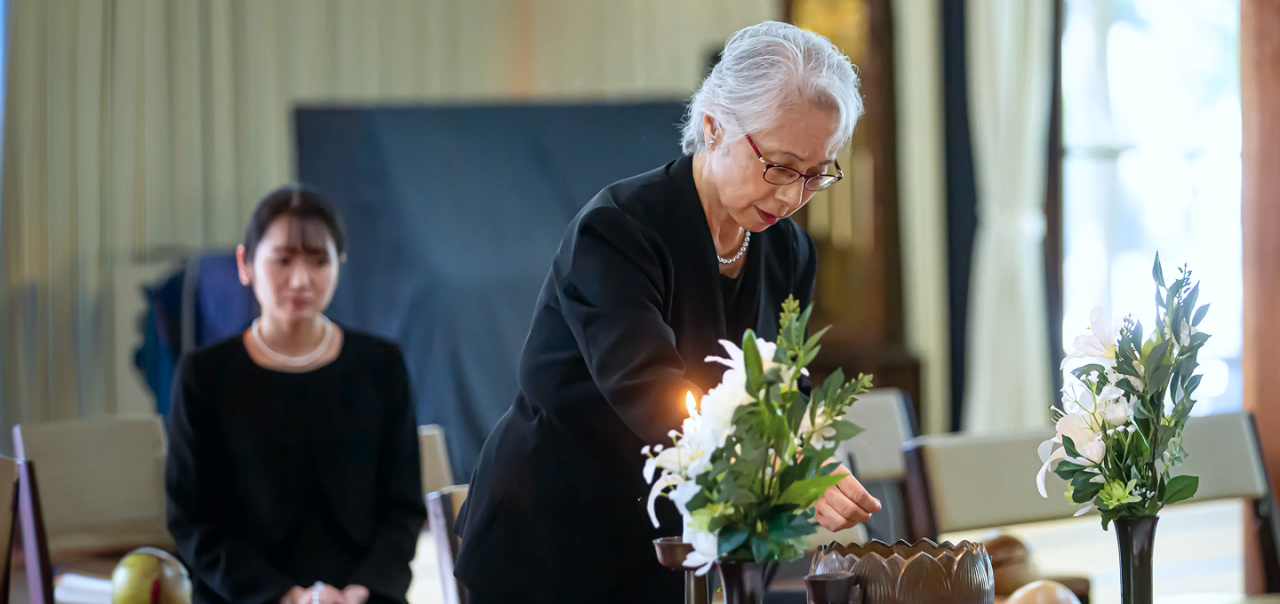 a woman paying her respects