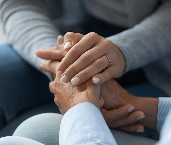 two people holding hands