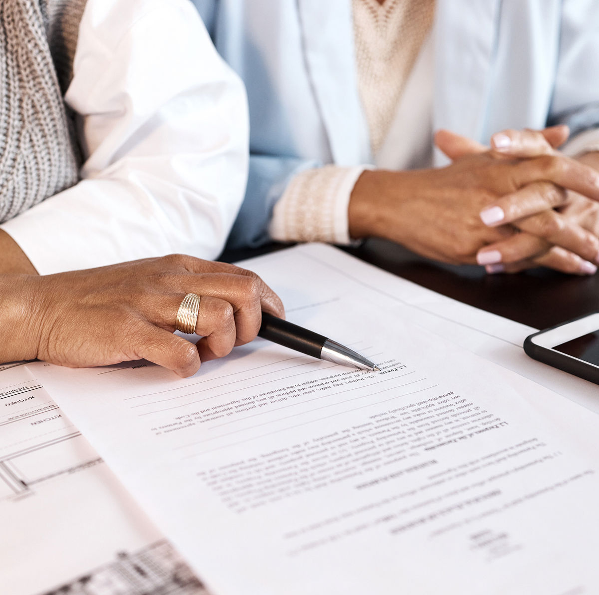 people doing paperwork