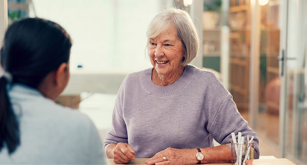 funeral director helping woman plan a funeral
